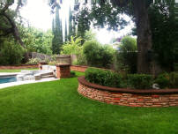 Ledgestone garden wall made by homeowner Scott Sellers.