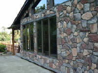 Concrete Fieldstone siding made with our moulds by Mrs. Clarke.