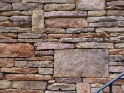 Drystack Ledgestone Stackstone wall cast with concrete.