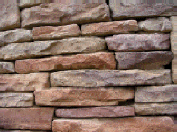 Drystack Ledgestone Stackstone walls cast with concrete.