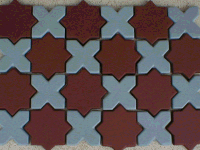 Photo of #0939 Style X-O tiles in light gray and red color.