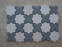 Photo of #0939 - style X-O tiles in dark gray and white color made with plaster of Paris.