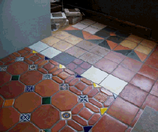 Assorted concrete floor tiles.