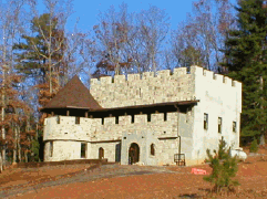 Castle Stone castle siding cast from concrete molds.