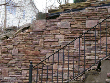 Drystack Ledgestone Stackstone wall cast with concrete.