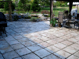 18x18 Castle Stone pavers cast from concrete molds.